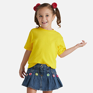 girl wearing yellow blank t shirt from Delta Apparel wholesale Pro Weight Juvenile 5.2 Oz Short Sleeve Tee perfect for your custom grahic print or logo