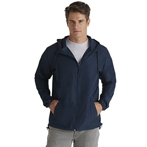man with hands in pockets wearing lightweight wind jacket from burnside apparel wholesale bulk jackets