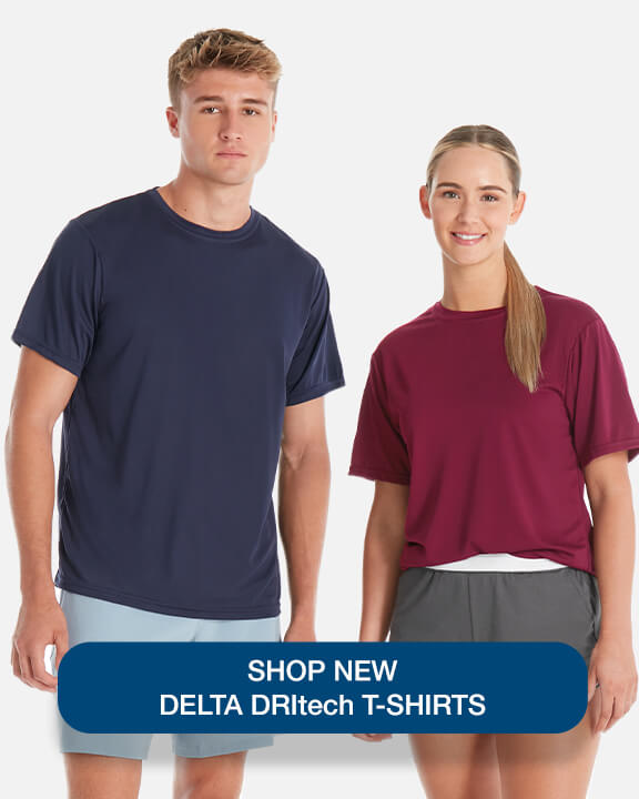 man wearing blue color Delta Dritech Adult Performance Short Sleeve wholesale T-Shirt blank made of 50 50 US cotton and polyester buy in bulk and save manufacturer direct