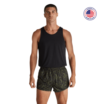 man facing front in a black tank top and camo printed running shorts