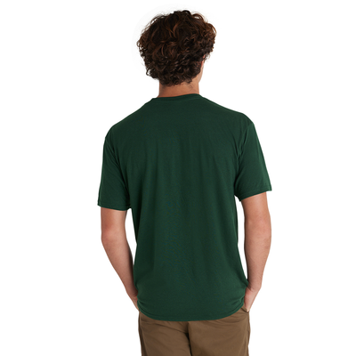 back view of man wearing green tee from delta apparel wholesale style 116535
