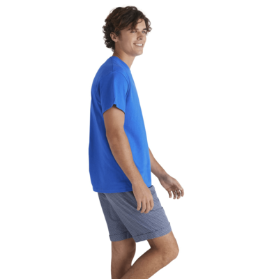 man facing sideways wearing Delta Pro Weight Adult Short Sleeve blank wholesale Tee in blue