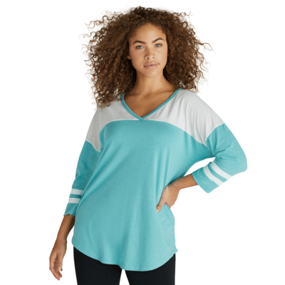 woman facing front wearing a turquoise and white striped v neck t shirt and black pants