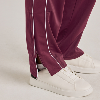 maroon and white stripe warm up pants with white sneakers 3245 hemline