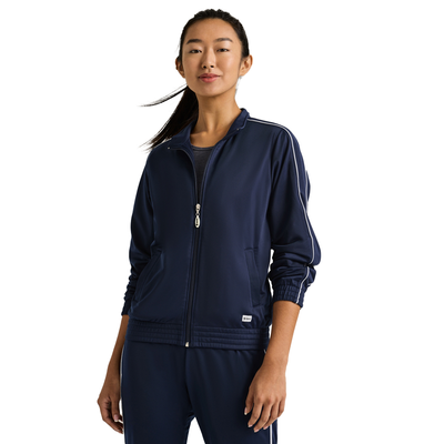 woman angled front wearing a navy zip up warm up jacket and white piping on the sleeves 3265V