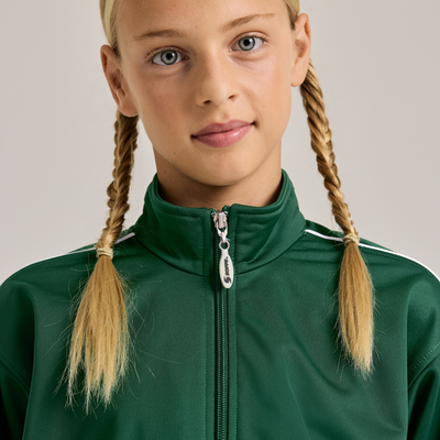 girl wearing green warm up jacket with white stripes 3265Y closeup