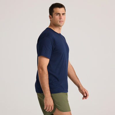 man facing side wearing a navy short sleeve shirt 682M-3