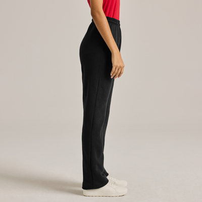 woman wearing black premiere pocket sweatpants 9343. sideview