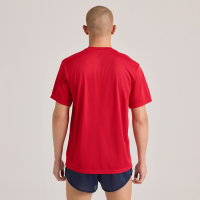 man facing back wearing a red performace crew neck short sleeve shirt 995a