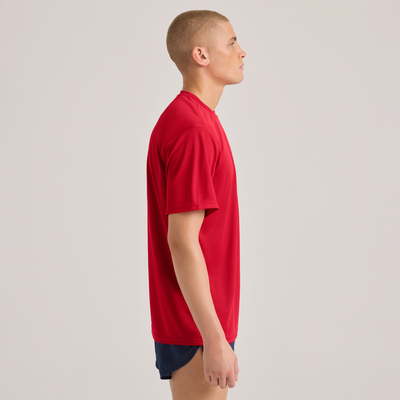 man facing side wearing a red performace crew neck short sleeve shirt 995a