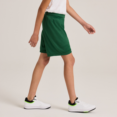 boy facing side wearing white tee with green shorts B058