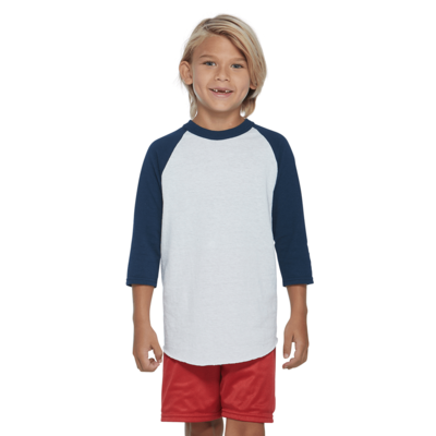 boy wearing a white and navy blue baseball shirt with red shorts