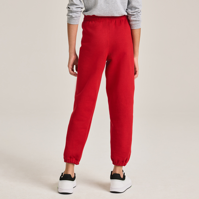 girl facing backward wearing red classic sweatpants and grey longsleeve tee B9041