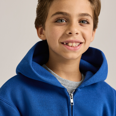 young boy wearing blue zip up hoodie J9078 close up