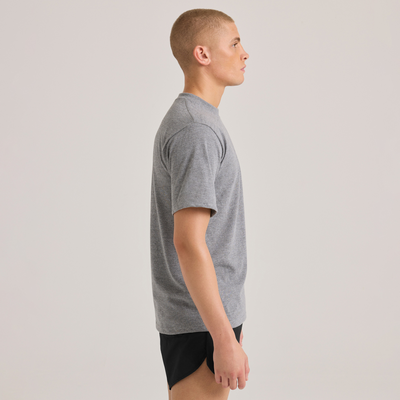 man facing forward wearing grey drirealease performance militry tee and black shorts M805 side