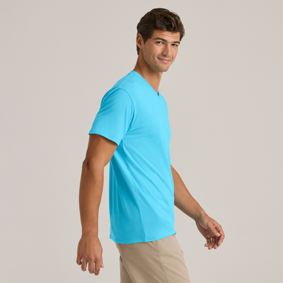 man looking to the side wearing Delta Platinum Adult Cvc Short Sleeve V-Neck blank wholesale Tee blue color style p602c