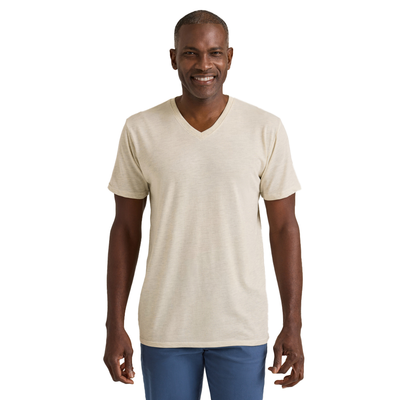 man looking forward wearing Delta Platinum Adult Tri-Blend Short Sleeve V-Neck blank wholesale Tee in oatmeal heather color