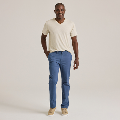 man facing forward wearing Delta Platinum Adult Tri-Blend Short Sleeve V-Neck blank wholesale Tee in oatmeal heather color