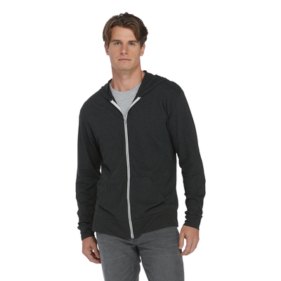 man facing forward wearing black heather zip up raglan hoodie P910T
