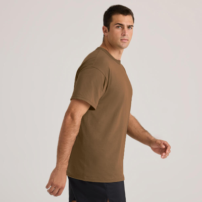 man facing forward wearing sand short sleeve military unisex tee M280 side view