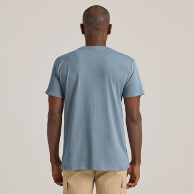 man facing away wearing a steel blue short sleeve crew neck blank wholesale tee shirt P601